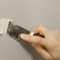 A Step-by-Step Guide to Repairing a Hole in Drywall